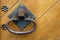 Close-up on an old metal wooden door handle