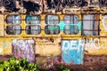 Old painted with graffiti metal wall. Royalty Free Stock Photo