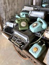 Close-up of old telephones and typewriters