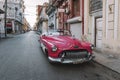 Close-up of old pink Chevrolet parked on Havana street. American classic cars typical of Cuba. Royalty Free Stock Photo