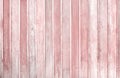 Old pink or light red plank wall  texture for background in vertical  patterns background Royalty Free Stock Photo