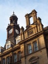 Close up of the the old post office in leeds city square in west yorkshire against a blue sky Royalty Free Stock Photo