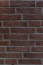 Close up of an old red orange brown worn and weathered brick wall, clinker bricks. Brick texture Royalty Free Stock Photo
