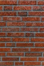 Close up of an old red orange brown worn and weathered brick wall, clinker bricks. Brick texture Royalty Free Stock Photo