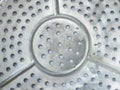Close up of old round silver aluminum steamer. It is commonly used in Taiwanese villages for steaming food. Retro style.