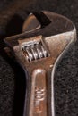 a close up of an old rust adjustable wrench using selective focus Royalty Free Stock Photo