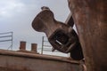 Close up old rusty anchor on old abandoned rusty ship Royalty Free Stock Photo