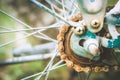 Close up of old rusty chain from the bicycle on background nature ,Bicycle`s detail view of wheel with old chain, sprocket,dirty