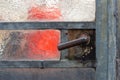 Close up of a old rusty door handle on a glass door in a abandoned greenhouse Royalty Free Stock Photo