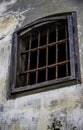 Rusty iron-barred window