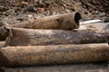 Close-up of old rusty iron pipes lie near the trench. The work of utilities to improve the infrastructure of the metropolis Royalty Free Stock Photo