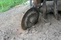 Close-up of old rusty plow tractor disk of a tractor on the construction site Royalty Free Stock Photo