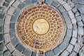 Close up of old sewer manhole cover Royalty Free Stock Photo