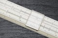 Close up of old slide rule Royalty Free Stock Photo