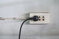 Close-up of old socket, electrical outlet with plug Royalty Free Stock Photo