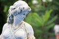 Close-up Old statue abandoned in a garden, portrait inspirations