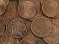 Close up of old used one and two euro cent coins background, end of small change or cash Royalty Free Stock Photo