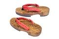 Close up old used wooden Japanese sandal isolated on white background. Royalty Free Stock Photo