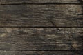 Close-up old vintage dark rough hardwood natural wooden surface background. Empty oak plank wood abstract backdrop