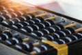 Close up of old vintage retro Chinese abacus on wooden table with copy space for background. Royalty Free Stock Photo