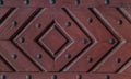 Close up of old vintage wooden door with metal furniture.  Brown wooden fence background texture Royalty Free Stock Photo