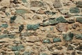 Close-up of old wall made of rough stones at Caceres