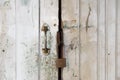 Close up Old white door and master key lock