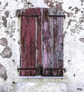 Old and worn closed wooden shutters Royalty Free Stock Photo