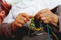 Close up of old woman hands knitting Royalty Free Stock Photo