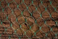 Close up of old wood fence panel with plastic diamond pattern n Royalty Free Stock Photo