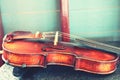 Close-up, old wood violin, vintage style, classical instrument isolation. Royalty Free Stock Photo