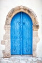 Close up of an old wooden blue door. Royalty Free Stock Photo