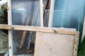 close up of old wooden dismantled window frames and balcony door Royalty Free Stock Photo