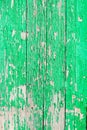 Close up of a old wooden door, green paint peeling off; texture Royalty Free Stock Photo