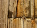 Close-up of old wooden door with rusty nails Royalty Free Stock Photo