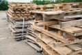 Close-up old wooden pallets.Wood pallet in factory area use for carry material and product supply to customers.Selective focus