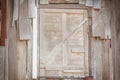 Old wooden window sealed with planks on backdround Royalty Free Stock Photo