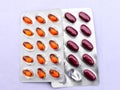 Close up of omega capsules and Multivitamin Suplements tablets strips. Royalty Free Stock Photo