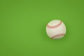 Close up one baseball ball over green Royalty Free Stock Photo