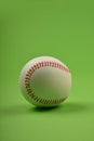 Close up one baseball ball over green Royalty Free Stock Photo