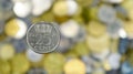 A close-up of one 25 cent coin from 1978, Netherlands. This is money. Blurred money background. Made from nickel Royalty Free Stock Photo