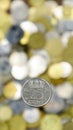 A close-up of one 25 cent coin from 1978, Netherlands. This is money. Blurred money background. Made from nickel Royalty Free Stock Photo