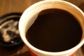 Close up of one cup of hot coffee on table at food court Royalty Free Stock Photo