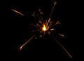 Close up one firework sparkler over blue bokeh Royalty Free Stock Photo