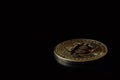 Close up one golden coin with bitcoin symbol on black background. Cryptocurrency, Money coins digital. Blockchain technology, Royalty Free Stock Photo