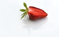 Close-up of one half of a juicy strawberry berry. Side view, macro shot on white background Royalty Free Stock Photo