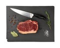 Close up raw beef ribeye steak on slate board Royalty Free Stock Photo