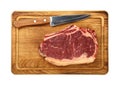 Close up raw beef ribeye steak on wooden board Royalty Free Stock Photo