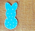 Close-up of one paper rabbit silhouette frame against canvas background Royalty Free Stock Photo