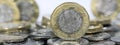 Close up of One Pound Coins - British Currency Royalty Free Stock Photo